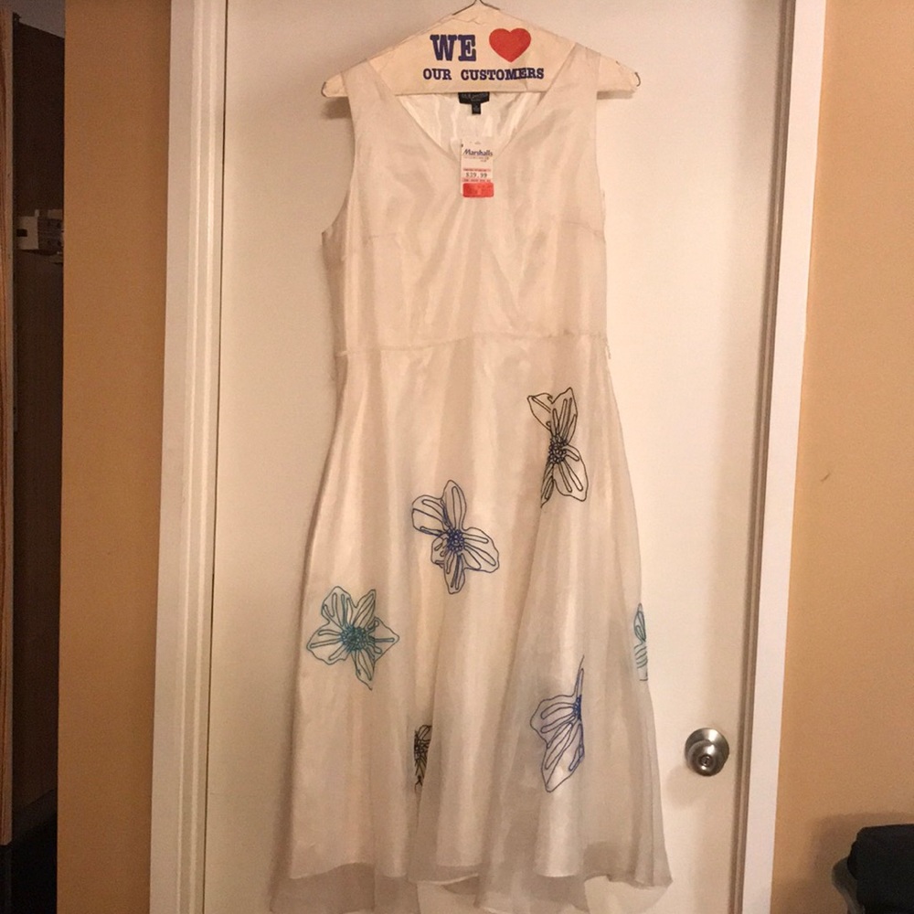 White crepe dress with flower appliqués. Size 14